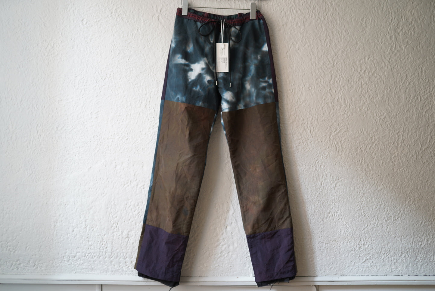 21AW INJECTION DYEING TRACK PANTS レッド / Children of the discordance(チルドレンオブザディスコーダンス)