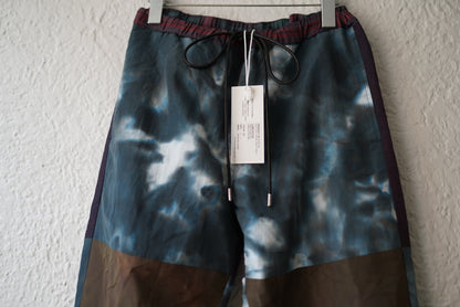 21AW INJECTION DYEING TRACK PANTS レッド / Children of the discordance(チルドレンオブザディスコーダンス)