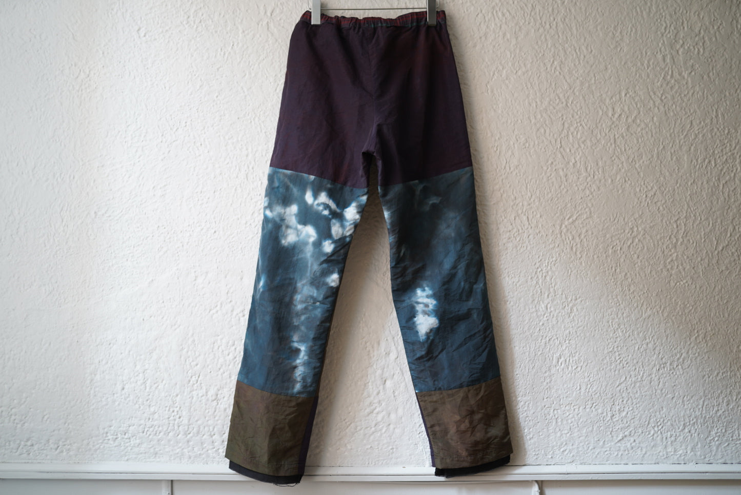 21AW INJECTION DYEING TRACK PANTS レッド / Children of the discordance(チルドレンオブザディスコーダンス)
