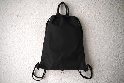 26SS PACK TOTE SACK ナイロンナップサック リュックサック / Cornelian Taurus(コーネリアンタウラス)