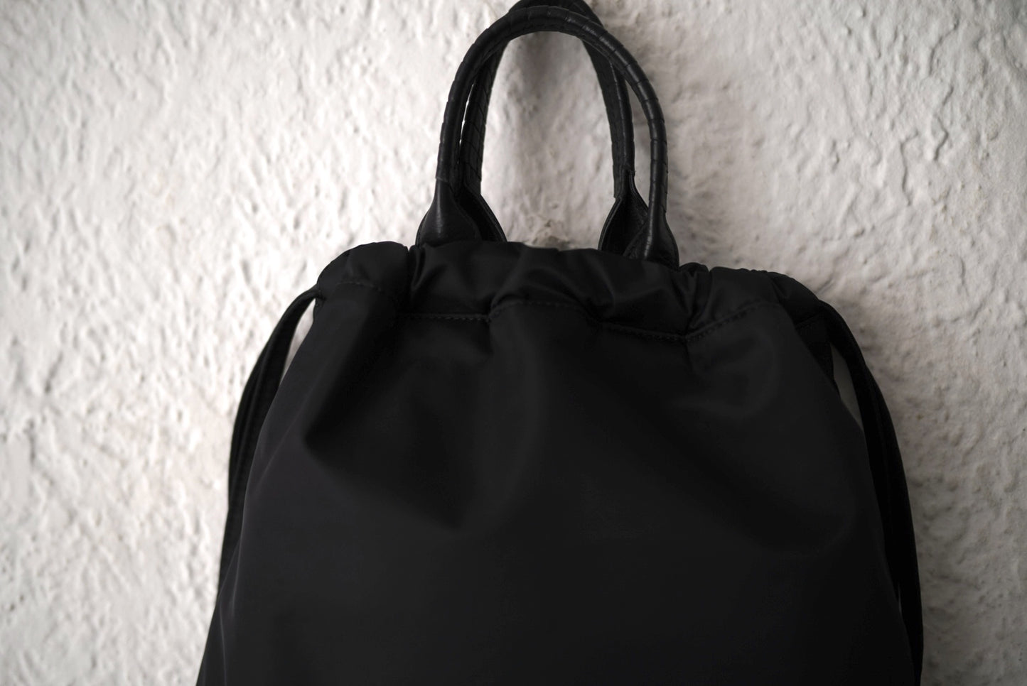 26SS PACK TOTE SACK ナイロンナップサック リュックサック / Cornelian Taurus(コーネリアンタウラス)