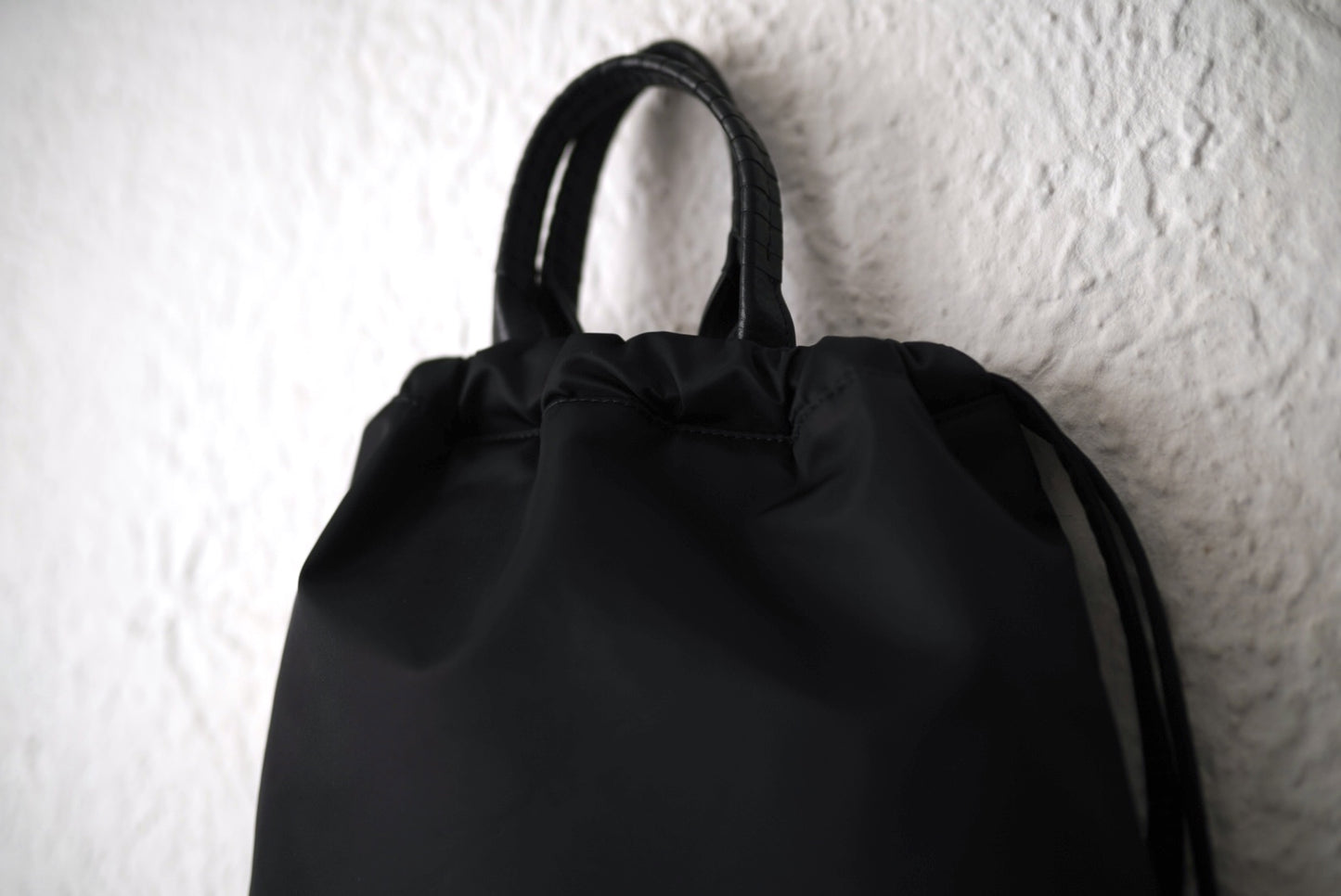 26SS PACK TOTE SACK ナイロンナップサック リュックサック / Cornelian Taurus(コーネリアンタウラス)