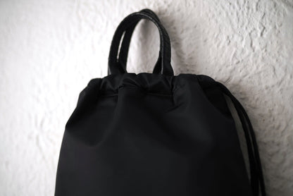 26SS PACK TOTE SACK ナイロンナップサック リュックサック / Cornelian Taurus(コーネリアンタウラス)