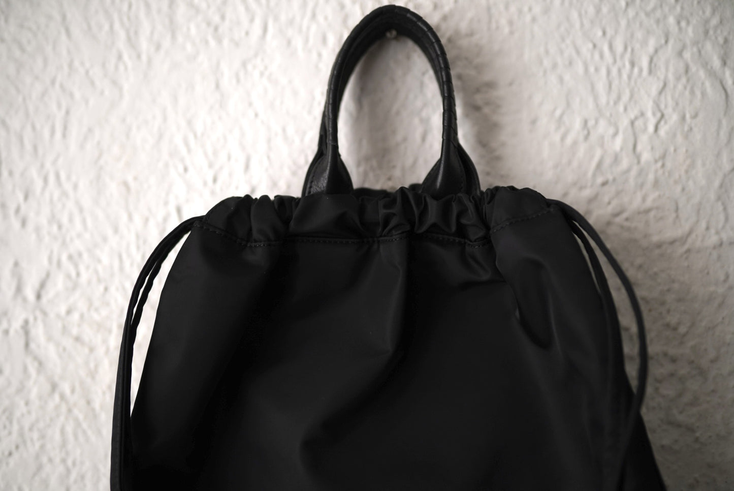 26SS PACK TOTE SACK ナイロンナップサック リュックサック / Cornelian Taurus(コーネリアンタウラス)