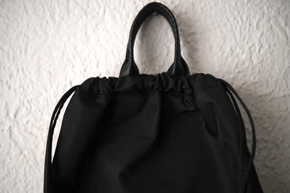 26SS PACK TOTE SACK ナイロンナップサック リュックサック / Cornelian Taurus(コーネリアンタウラス)